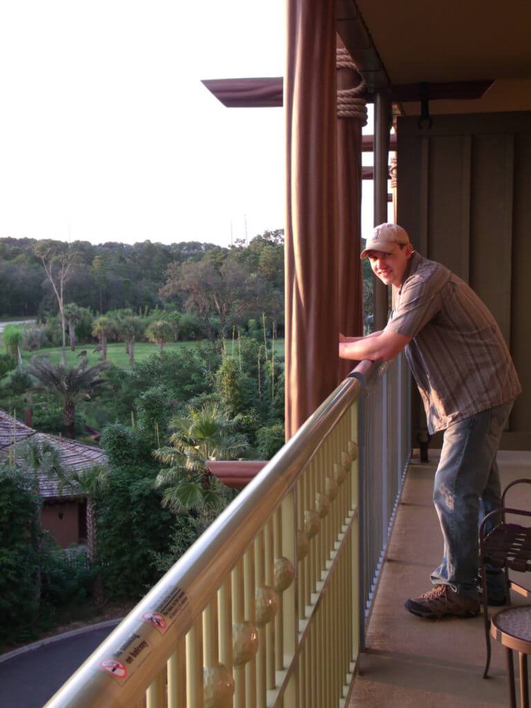 Man on balcony at Disney's Animal Kingdom Lodge