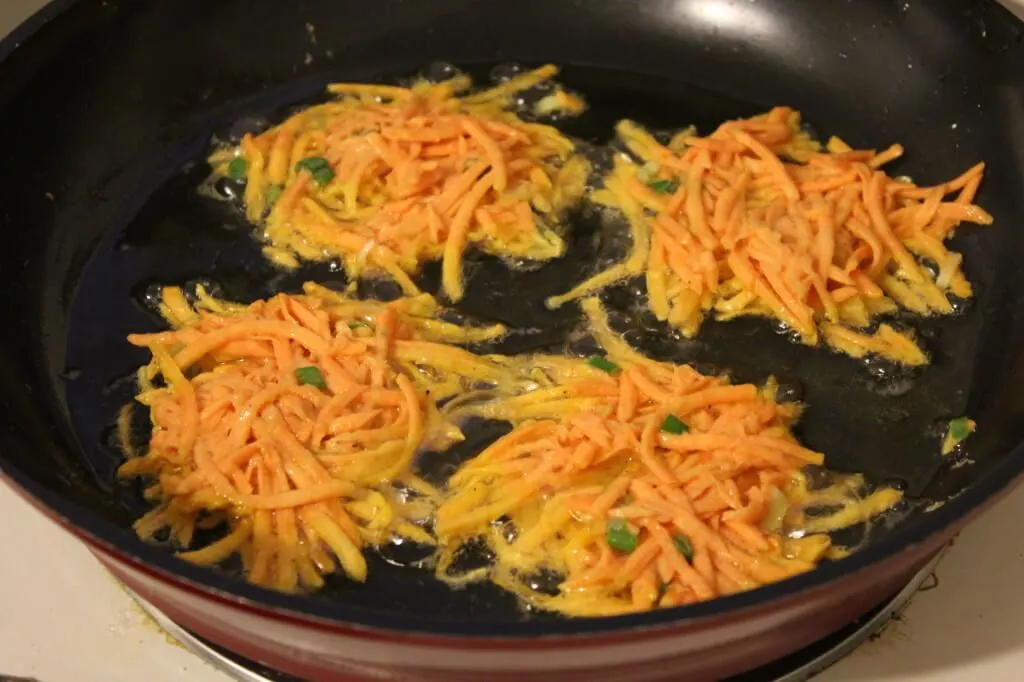 sweet potato latkes in the pan
