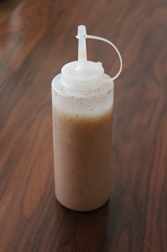 homemade salad dressing in a condiment container