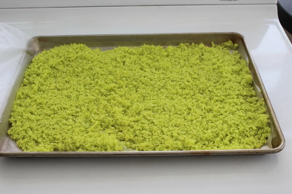 green rice on baking sheet