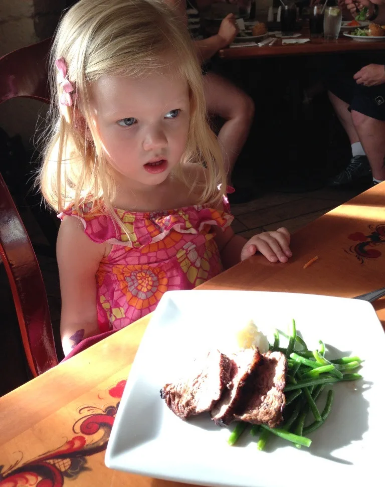 little girl eating her lunch at Akershus