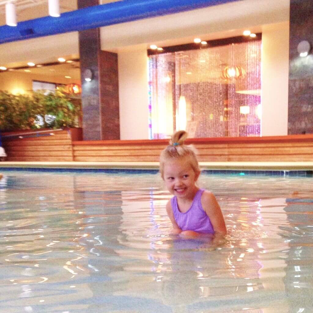 little girl enjoying the saltwater pool