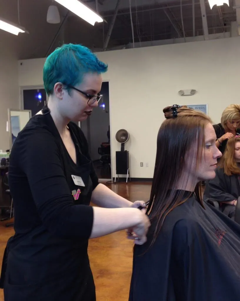 woman receiving haircut