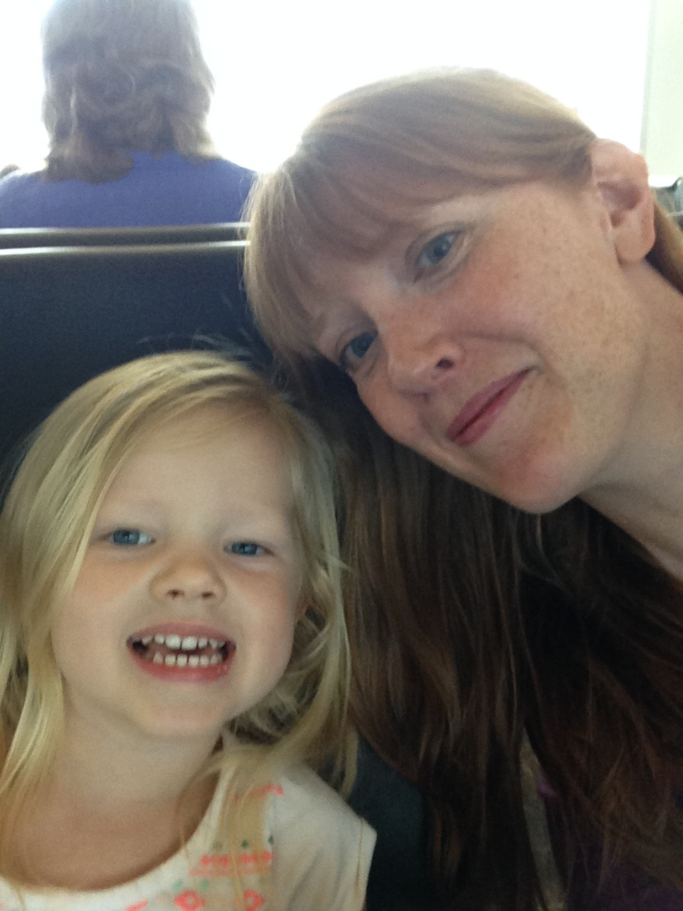 mommy daughter airport selfie