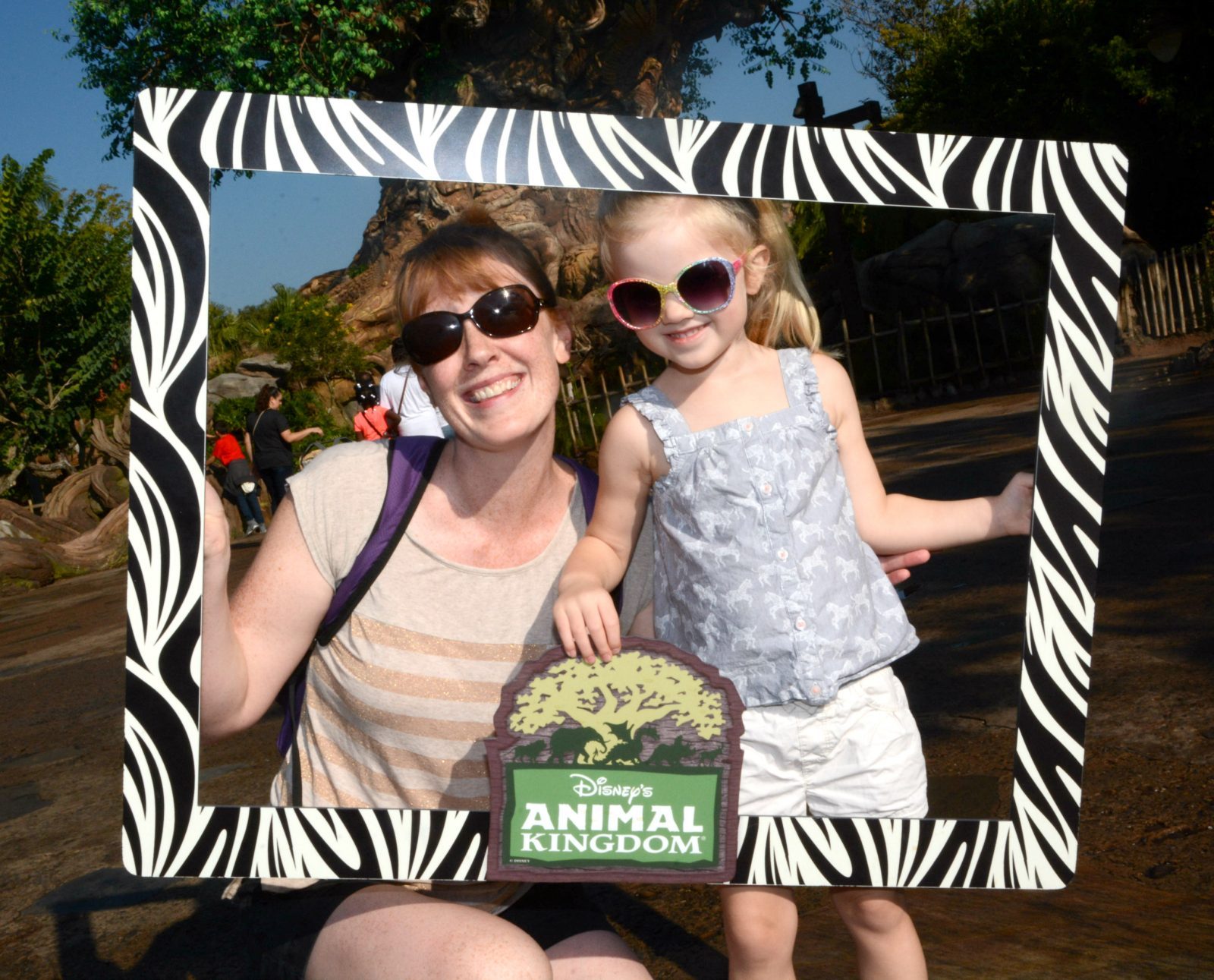 mommy daughter zebra frame photo at animal kingdom
