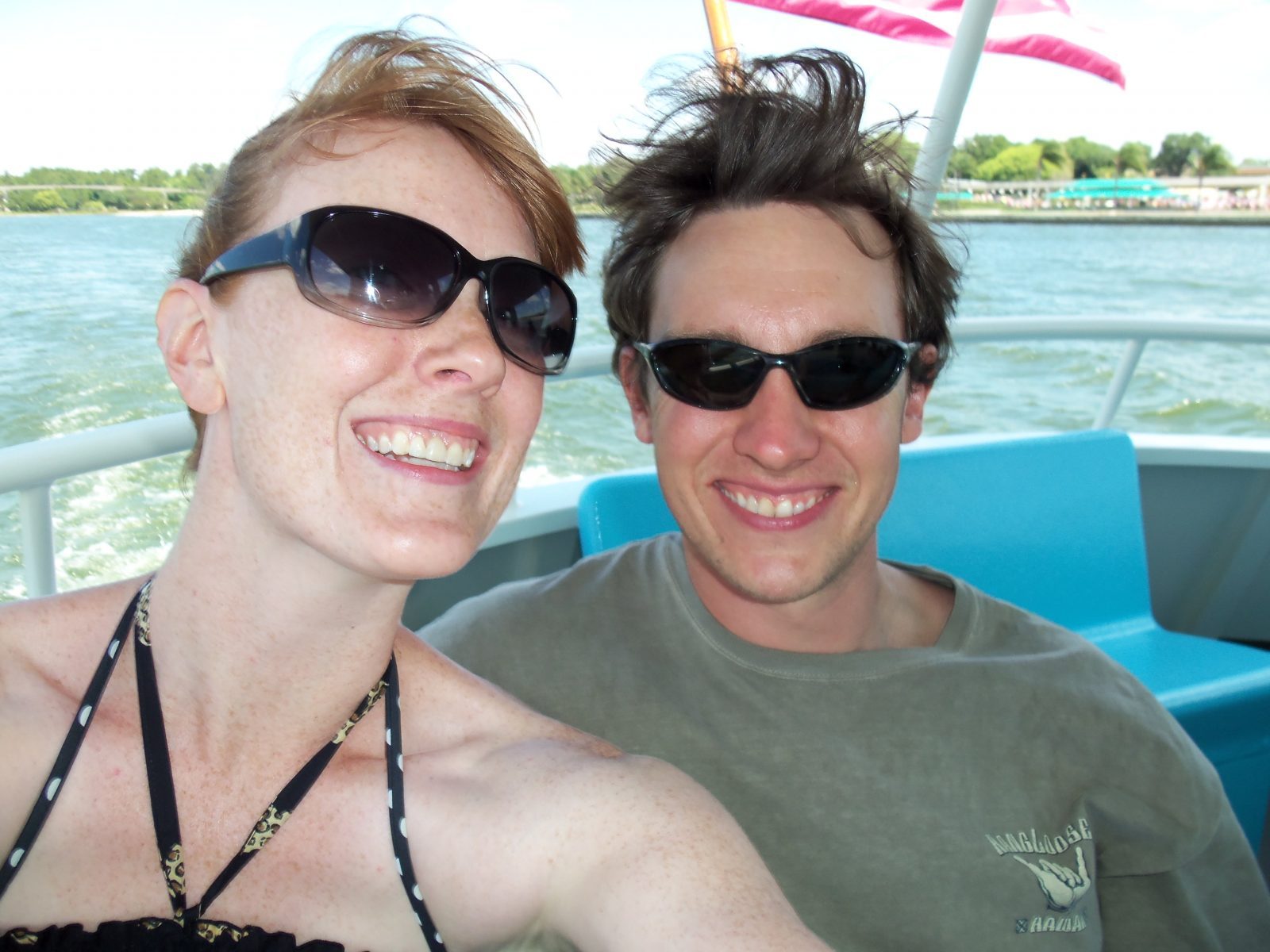 couple enjoying a boat ride at disney