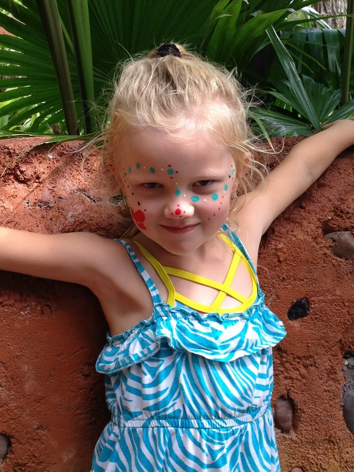 little girl with her face painted