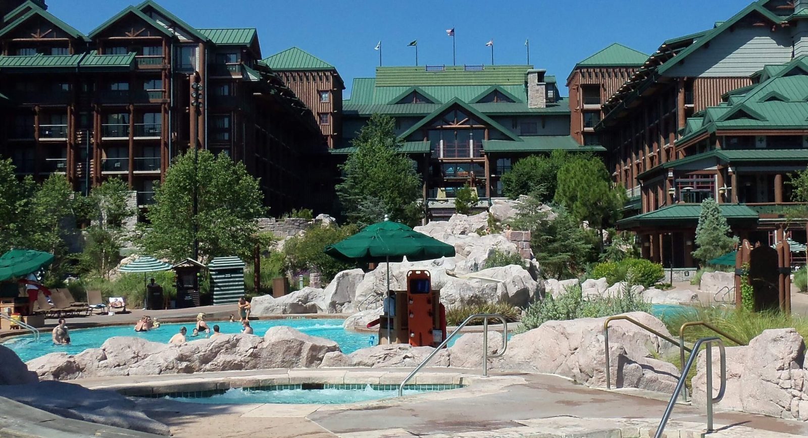 Pool and exterior of disney's wilderness lodge