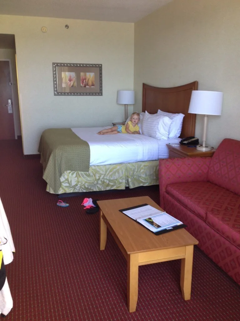 interior of hotel room - bed and seating area