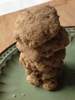 whole wheat flaxseed cookies stacked up on a plate