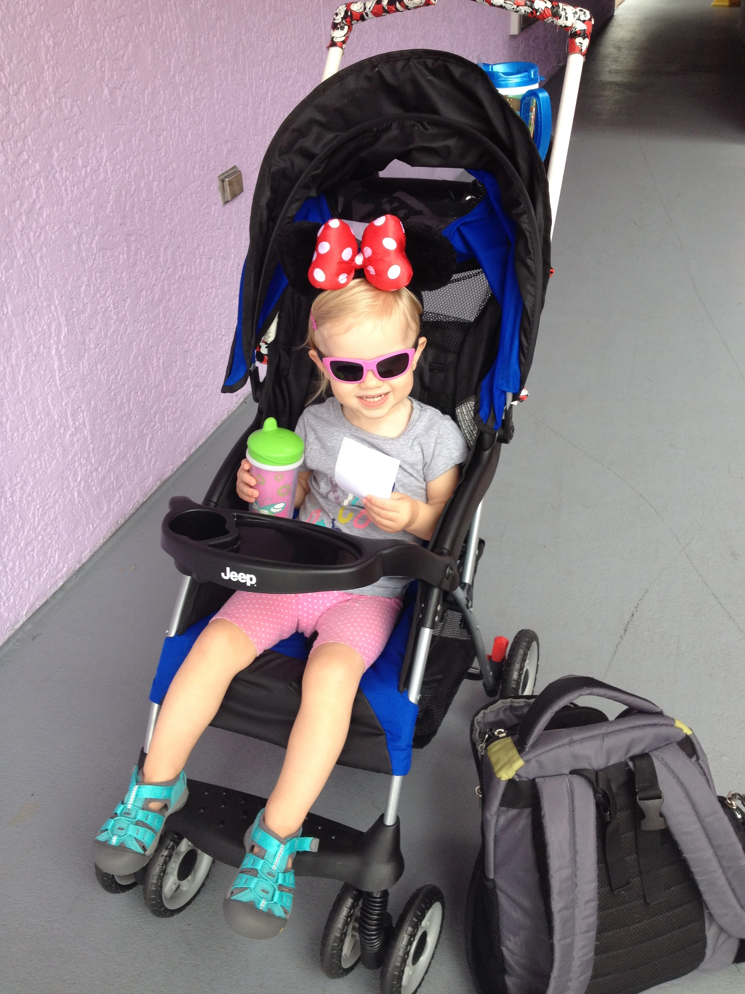 little girl in a stroller