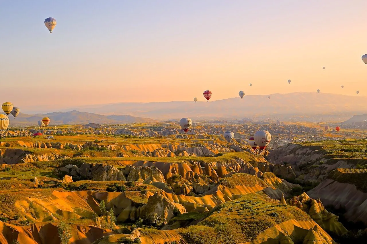 hot air balloons flying over Turkey