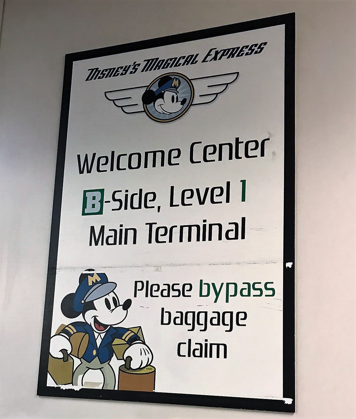 Disney Magical Express sign in Orlando International Airport