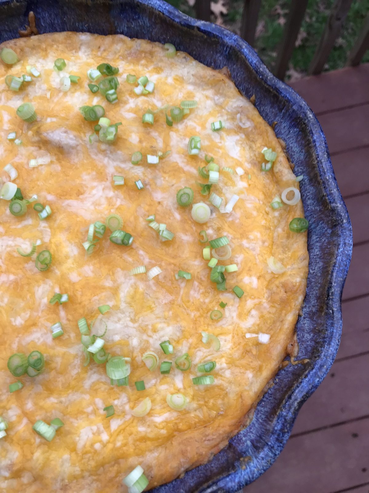 Cheesy hot black eyed pea dip in a pie plate