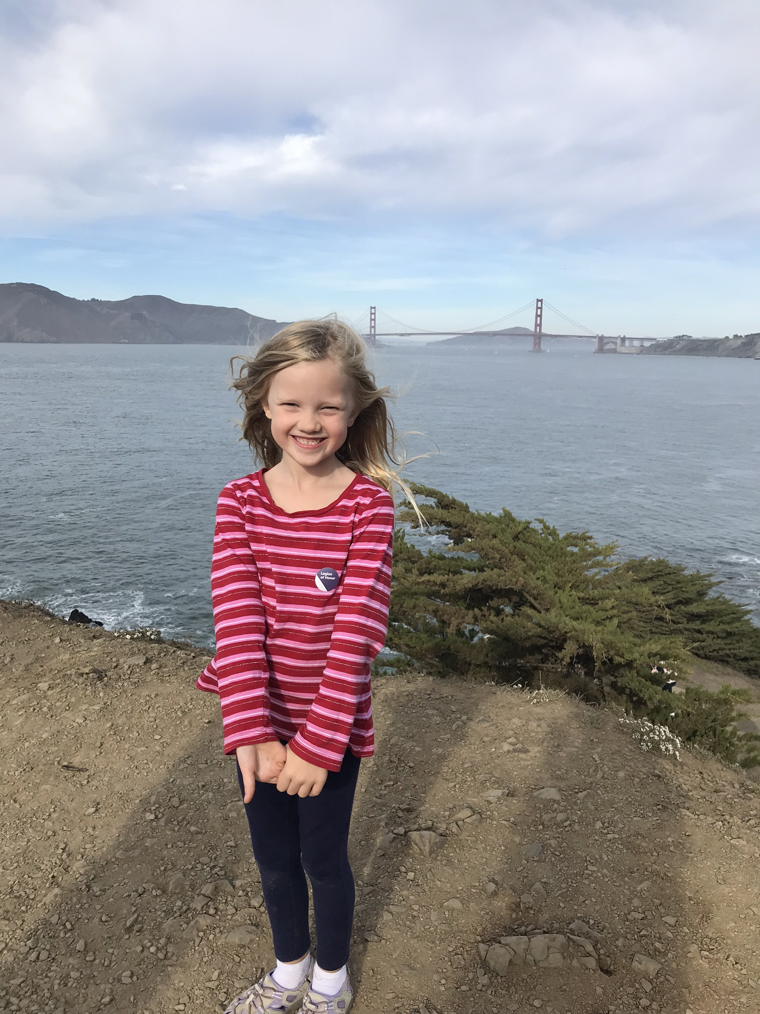 little girl with golden gate bridge in the background