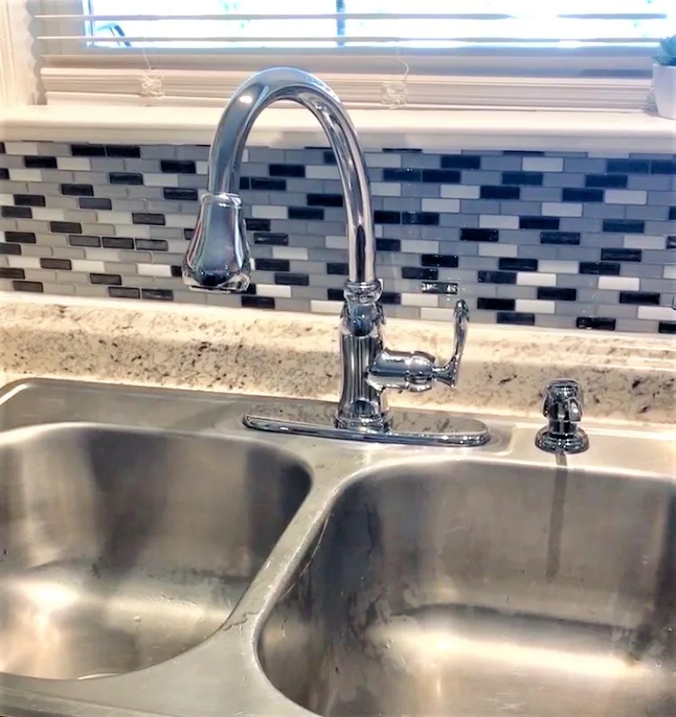 kitchen sink with backsplash
