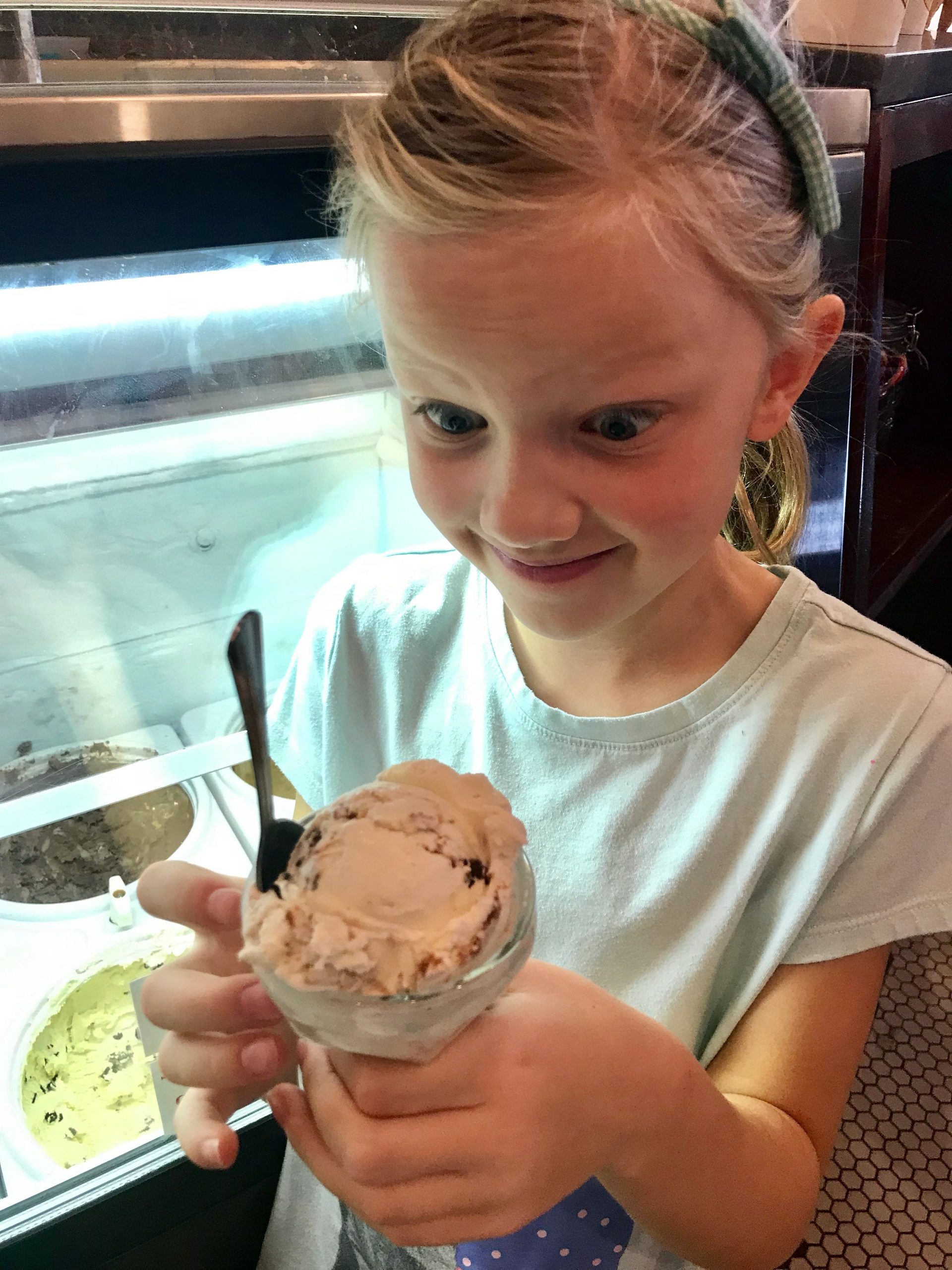 girl looking at ice cream 
