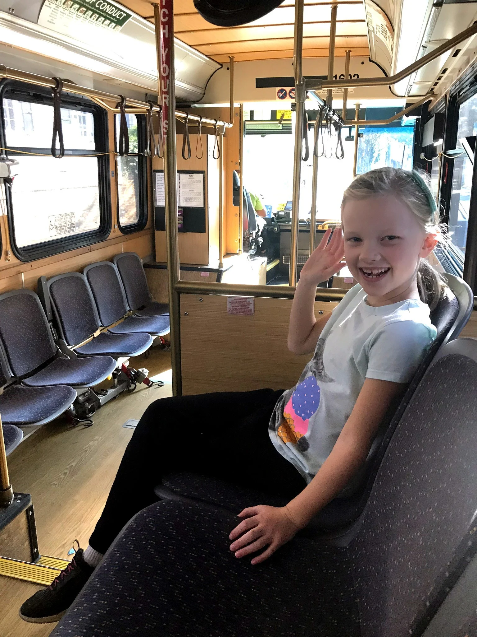 girl riding trolley bus in savannah