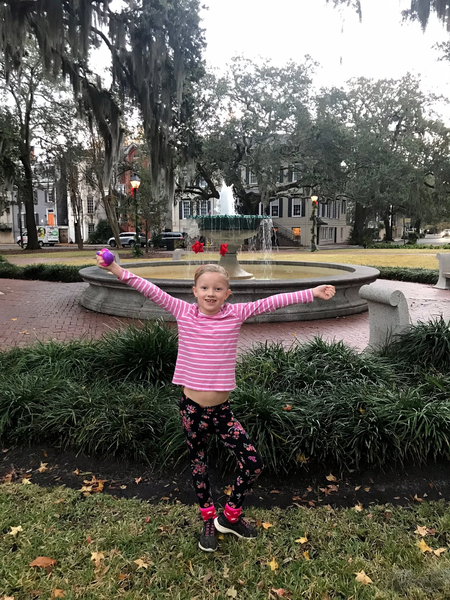 girl in front of fountain in Savannah 
