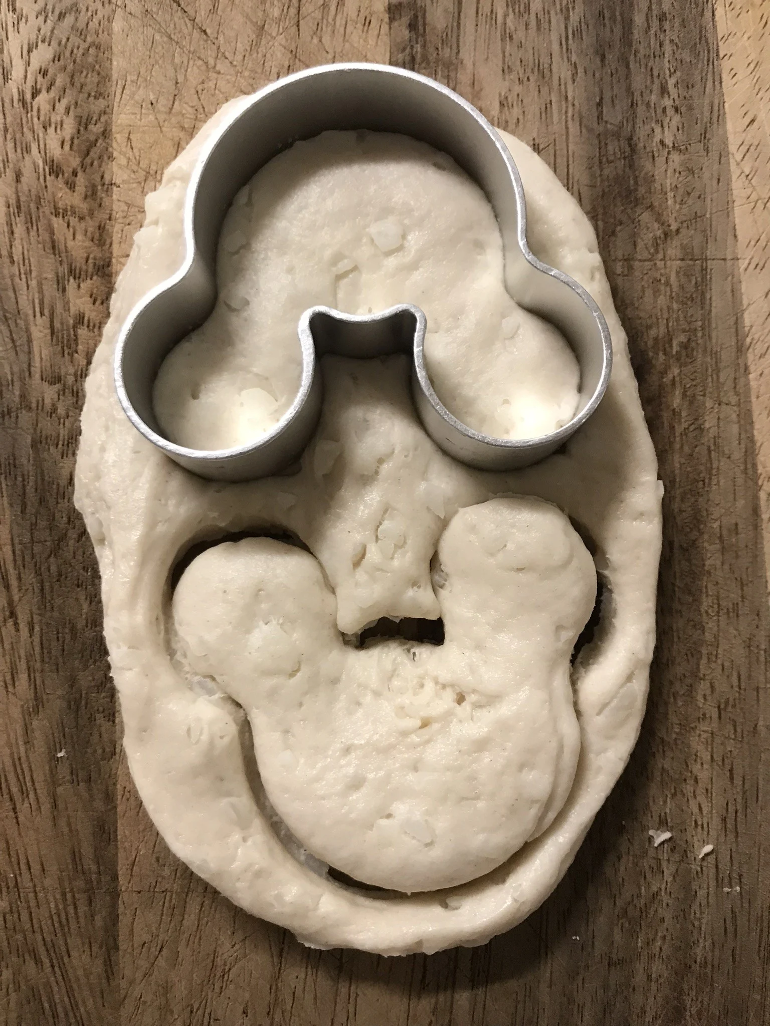 cutting out mickey air fryer biscuit donuts