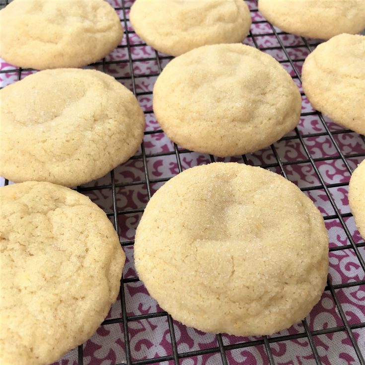 cooked sugar cookies on baking sheet