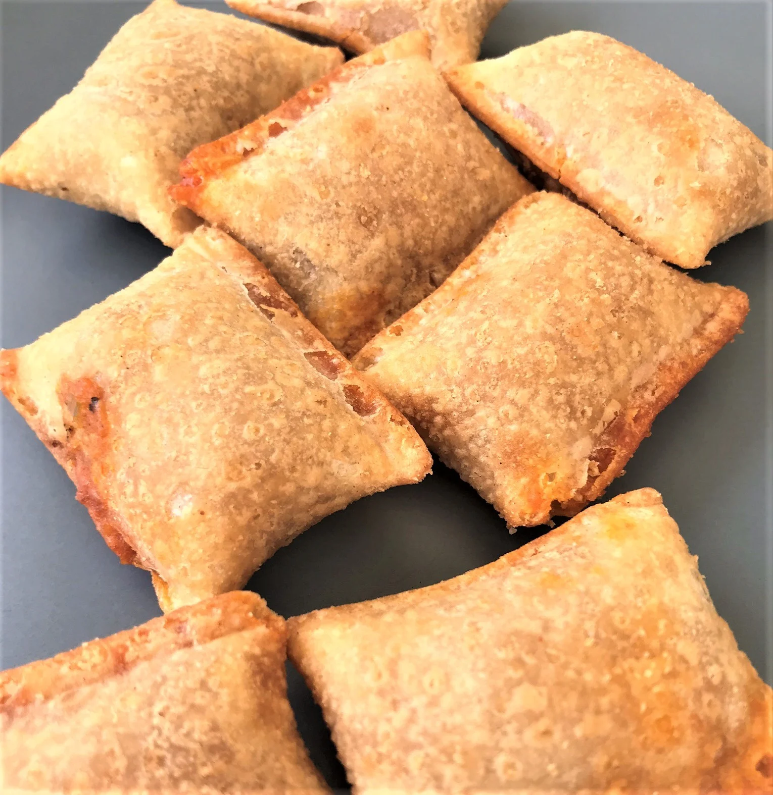 air fryer pizza rolls on a plate