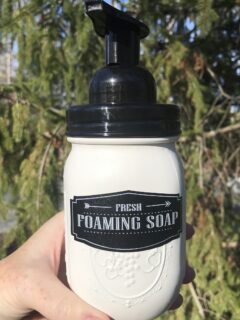white jar of foaming hand soap with black pump top