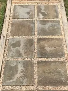 walkway made from concrete stepping stones and gravel