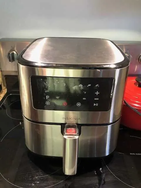 insignia 5 qt air fryer on a stovetop