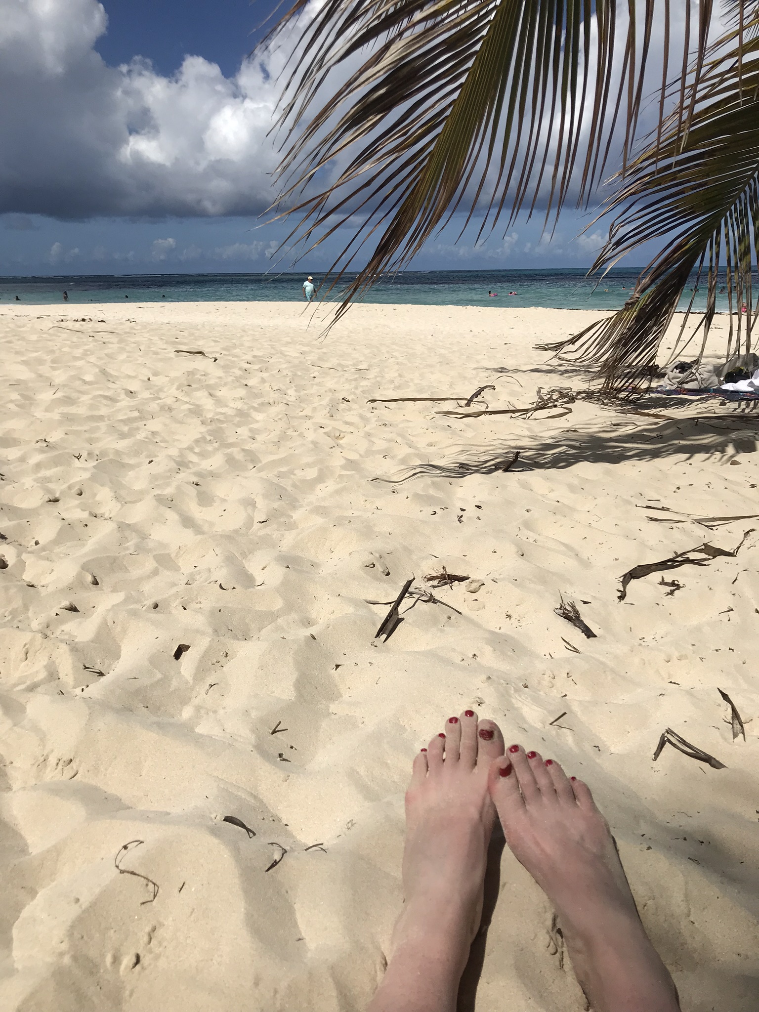 toes in sand at flamenco beach