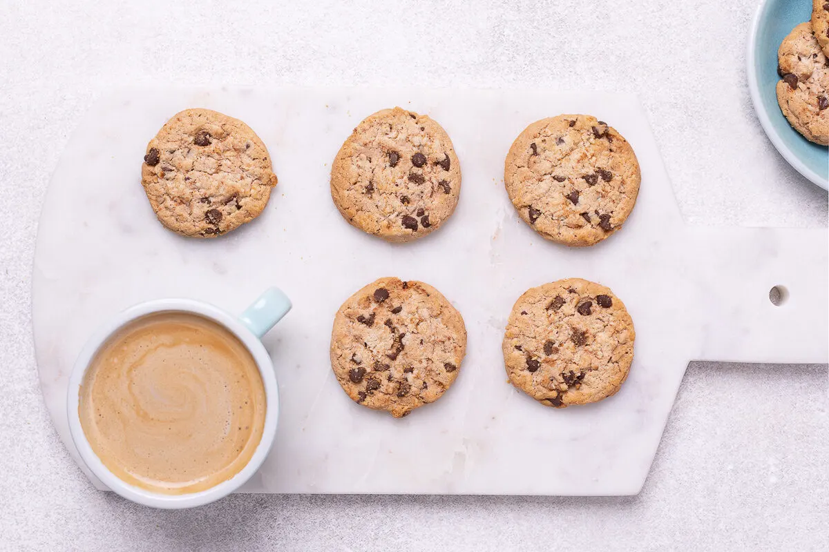 cookies on a tray with latte