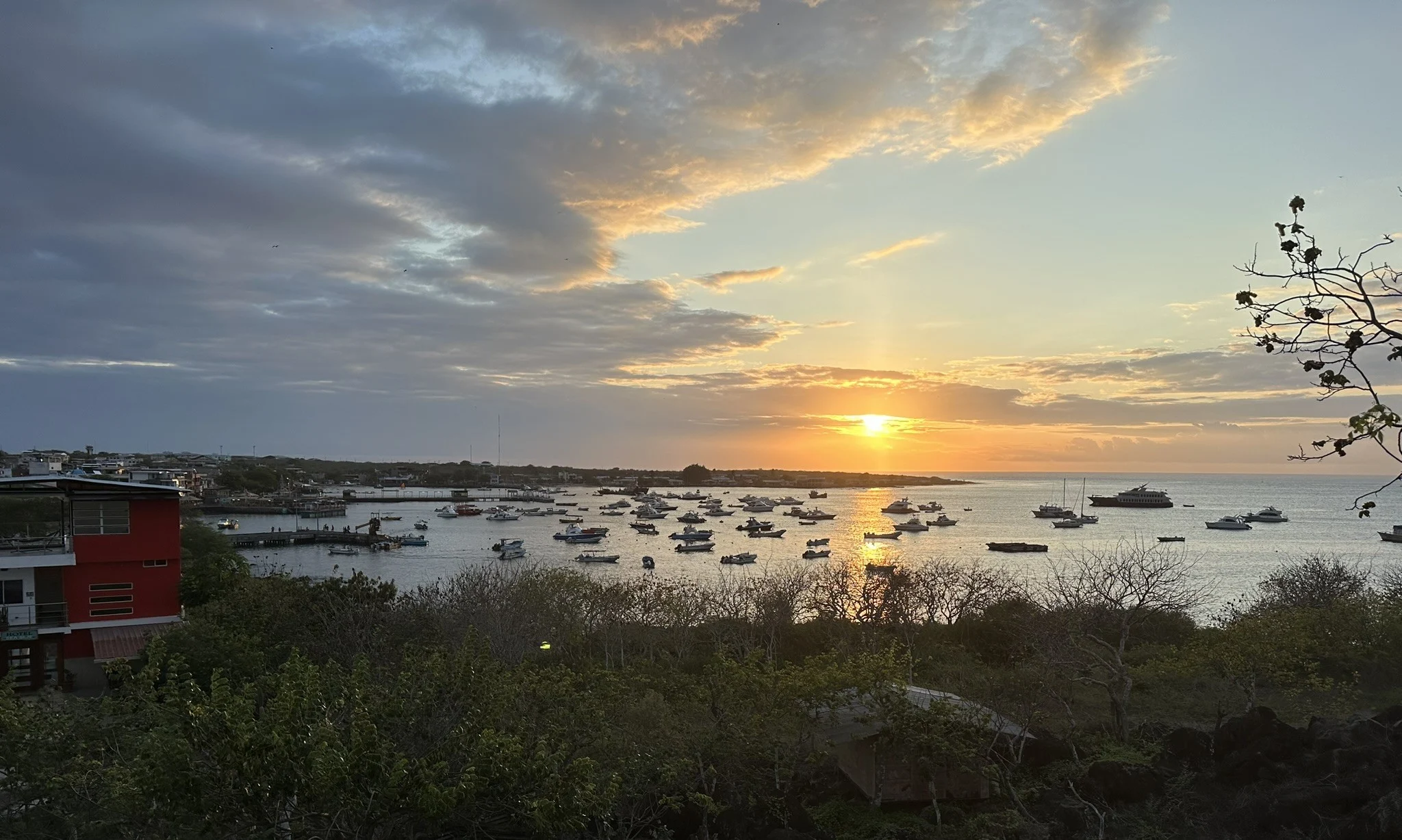 san cristobal galapagos harbor at sunset