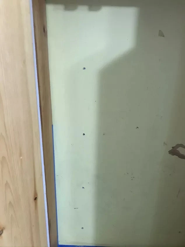 holes in wall for diy pantry shelves